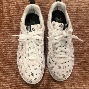 Skechers White Sneakers with Black Accents